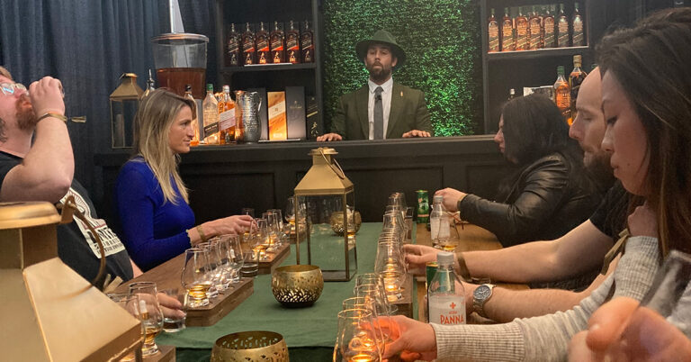 Johnnie Walker brand ambassador leading whisky tasting during Seattle Cocktail Week