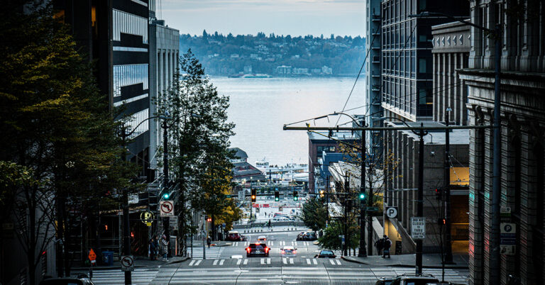 Seattle waterfront scene with iconic street view, pier, and Puget Sound landscape